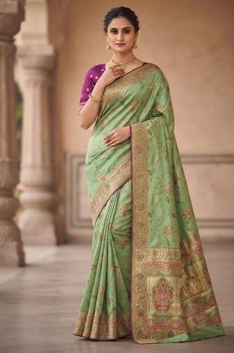 Parrot Green Jaqurad Weaving All Over Body Jaal With Border Naylon Dola Pashmina Silk Saree