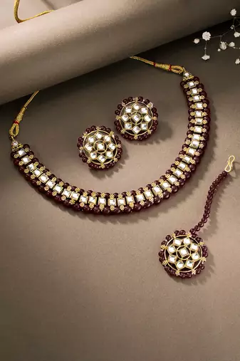Gold plated kundan & maroon beads studded choker necklace earrings & maangtikka set ethnic jewellery for women