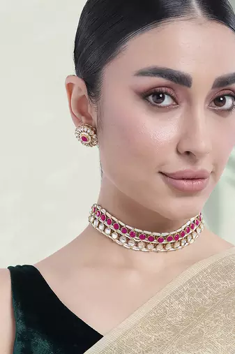 Gold plated kundan synthetic stone & beads studded rani pink necklace & round stud earrings set