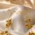 Gold plated pearl floral facelet for women | bridal traditional face jewelry