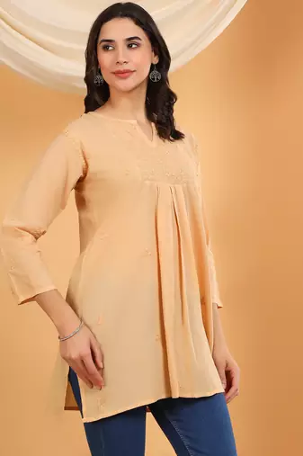 Women beige floral embroidered chikankari v neck pure cotton flared short kurtis