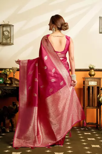 Rani pink premium soft silkblend saree with tassels & blouse piece