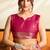 Rani pink premium soft silkblend saree with tassels & blouse piece