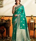 Green premium soft silkblend saree with tassels & blouse piece