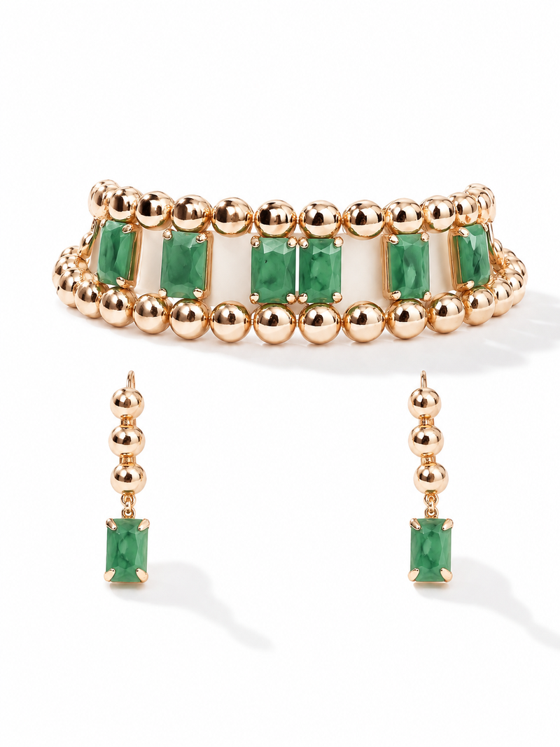Gold-toned bracelet and drop earrings set with green stones