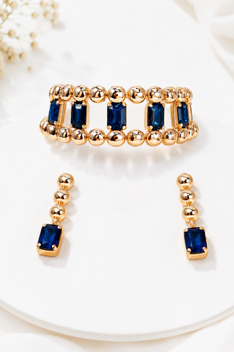 Gold-tone blue crystal choker necklace and earrings set
