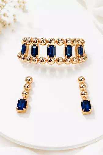 Gold-tone blue crystal choker necklace and earrings set