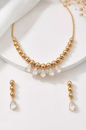 Gold-toned beaded necklace and earrings jewellery set with crystal drops