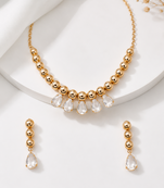 Gold-toned beaded necklace and earrings jewellery set with crystal drops