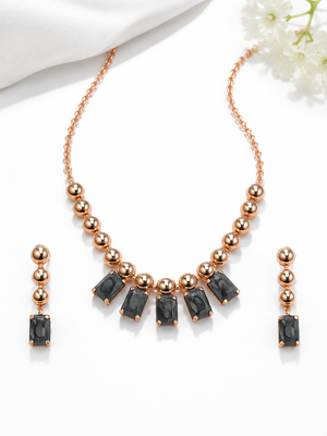 Rose gold necklace and earrings set with black crystal stones 1