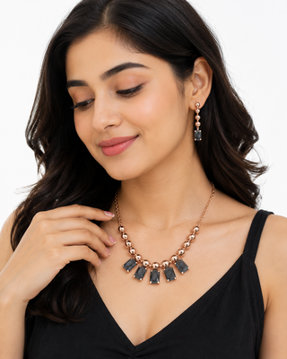 Rose gold necklace and earrings set with black crystal stones 2