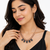Rose gold necklace and earrings set with black crystal stones