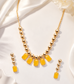 Gold-toned yellow stone necklace and earrings jewellery set