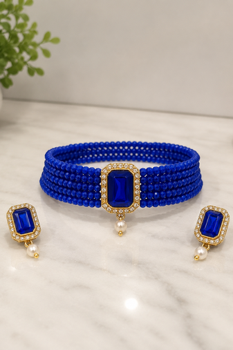 Blue beaded choker necklace and earrings set with crystal pendant