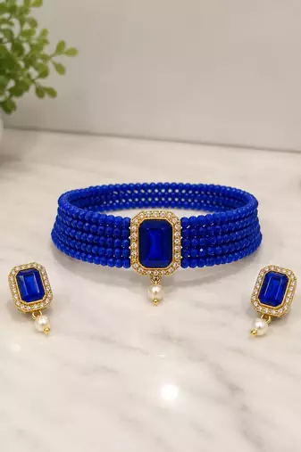 Blue beaded choker necklace and earrings set with crystal pendant