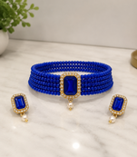 Blue beaded choker necklace and earrings set with crystal pendant