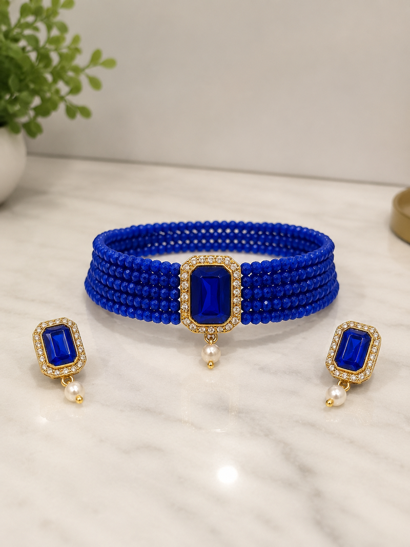 Blue beaded choker necklace and earrings set with crystal pendant