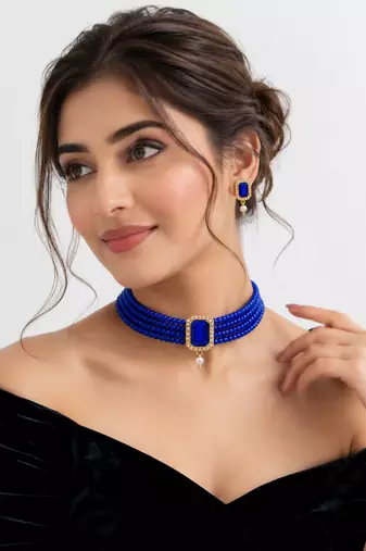 Blue beaded choker necklace and earrings set with crystal pendant