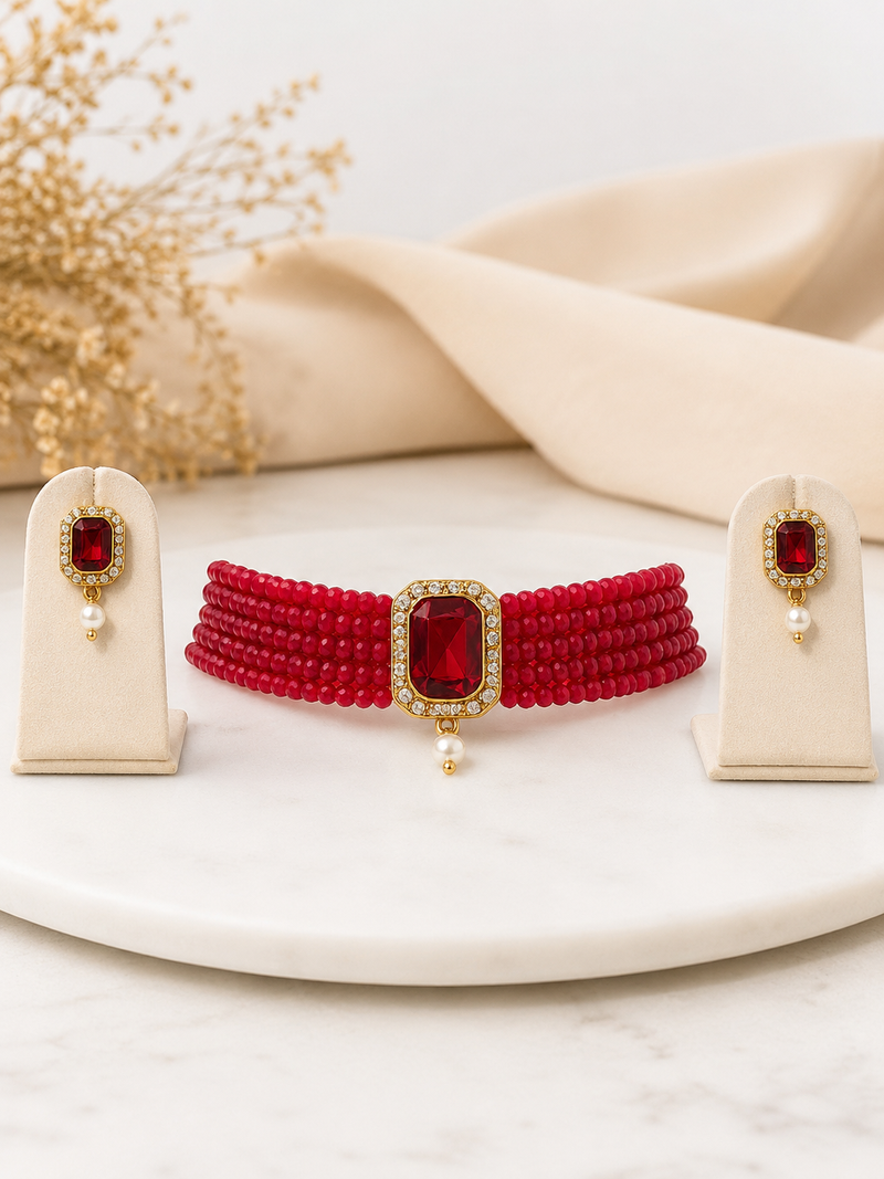 Red beaded choker necklace and earrings set with crystal pendant