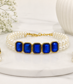 Pearl double strand bracelet and earring set with blue crystals