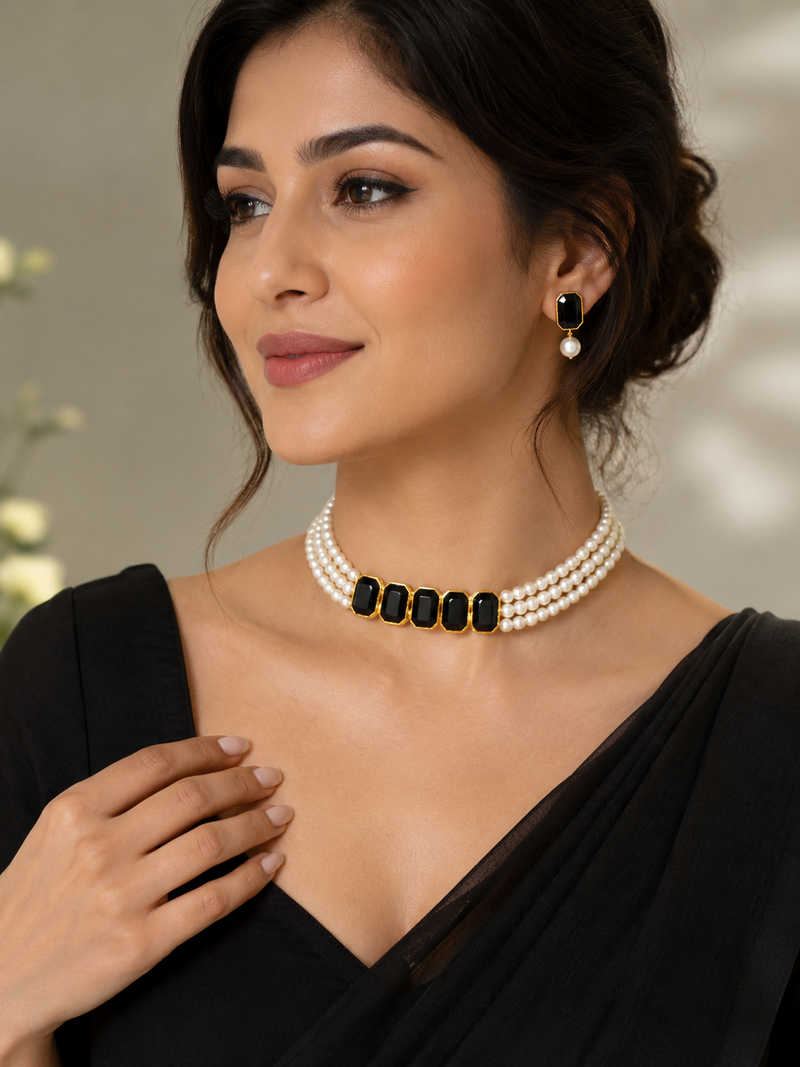 Pearl choker necklace set with black onyx stones, gold-toned