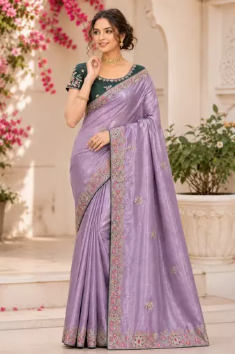 Lavender Color Golden Embroidery And Dori Work With Sequins Work All Over The Border And Motif Fandy Silk Saree