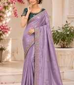 Lavender Color Golden Embroidery And Dori Work With Sequins Work All Over The Border And Motif Fandy Silk Saree