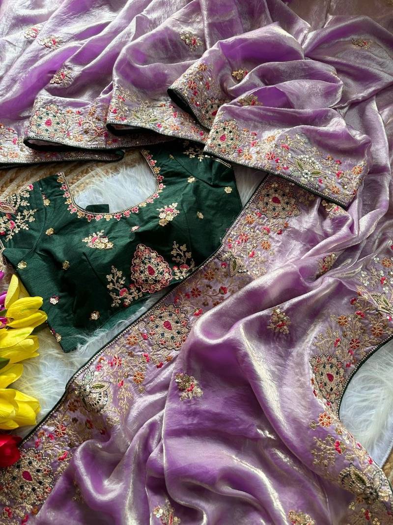 Lavender Color Golden Embroidery And Dori Work With Sequins Work All Over The Border And Motif Fandy Silk Saree