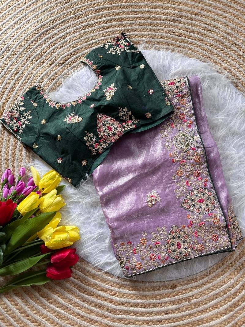 Lavender Color Golden Embroidery And Dori Work With Sequins Work All Over The Border And Motif Fandy Silk Saree