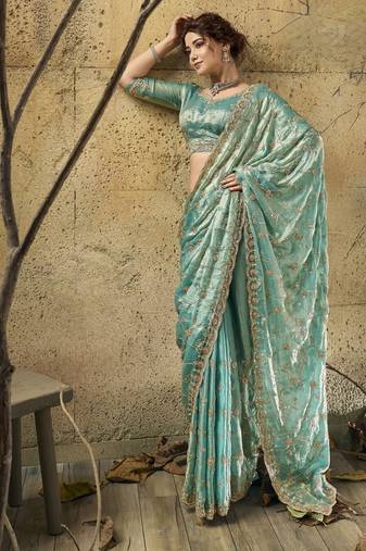 Green designer velvet satin embroidered saree with heavy blouse