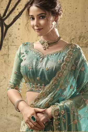 Green designer velvet satin embroidered saree with heavy blouse