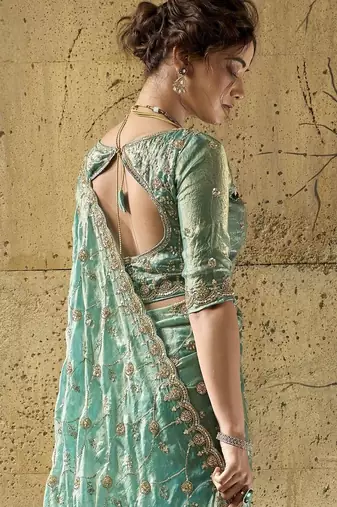 Green designer velvet satin embroidered saree with heavy blouse