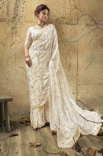 Ivory designer velvet satin embroidered saree with heavy blouse