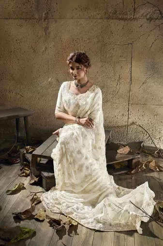 Ivory designer velvet satin embroidered saree with heavy blouse