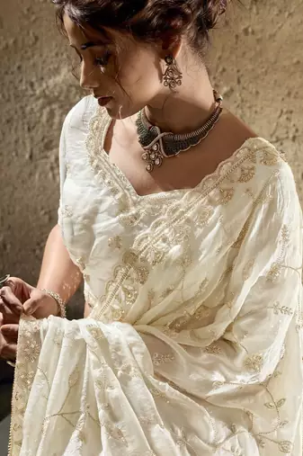 Ivory designer velvet satin embroidered saree with heavy blouse