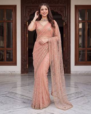 Peach designer net beads embroidery saree with unstitched blouse 1