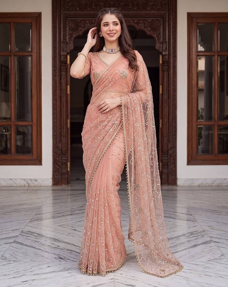 Peach designer net beads embroidery saree with unstitched blouse