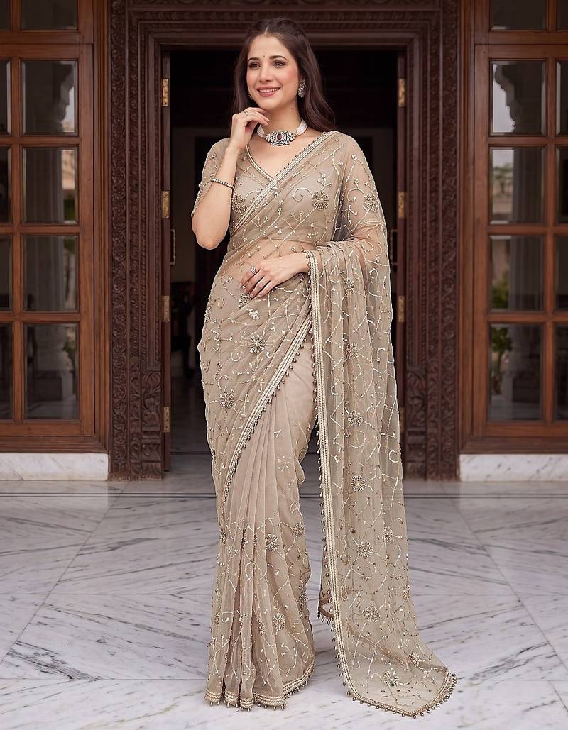 Beige designer net beads embroidery saree with unstitched blouse