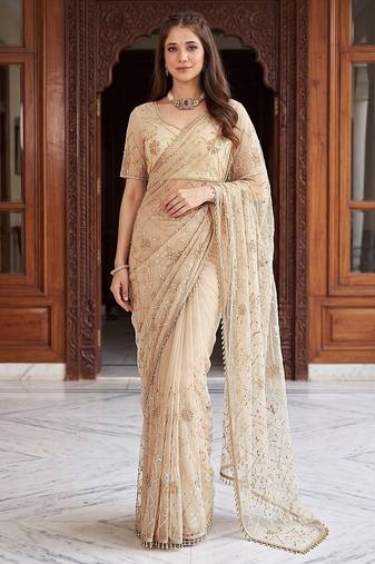 Cream designer net beads embroidery saree with unstitched blouse