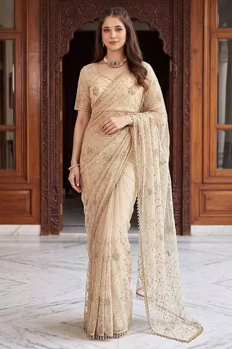 Cream designer net beads embroidery saree with unstitched blouse