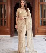 Cream designer net beads embroidery saree with unstitched blouse