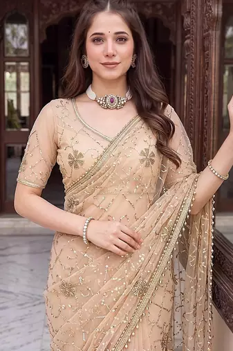 Cream designer net beads embroidery saree with unstitched blouse