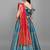 Turquoise Jacquard Woven Mehendi Lehenga Choli