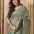 Green elegant cotton saree with tassels & blouse