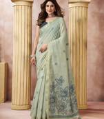 Green elegant cotton saree with tassels & blouse