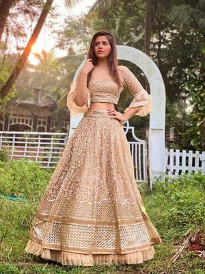 Beige Embroidered Net Semi Stitched Lehenga 4
