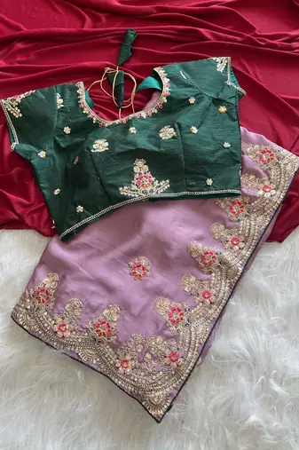 Lavender Color Golden Embroidery And Dori Work With Sequins Work All Over The Border Fandy Silk Saree
