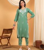 Women green ethnic motifs embroidered lucknowi chikankari rayon kurti & palazzo set