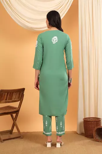 Women green ethnic motifs embroidered lucknowi chikankari rayon kurti & palazzo set