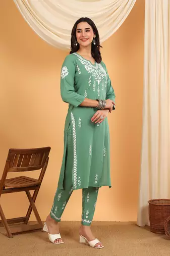 Women green ethnic motifs embroidered lucknowi chikankari rayon kurti & palazzo set